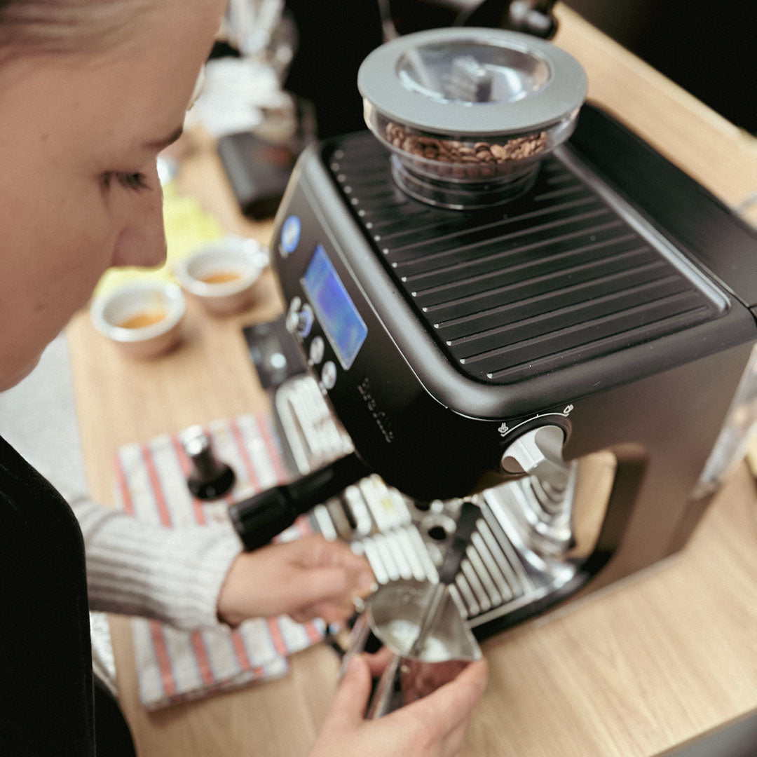 Milk being textured to a silky finish during the BYO Coffee Machine Barista Course at 23 Degrees Coffee Roasters.
