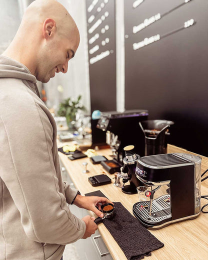 Strudent with his Breville Bambino in 23 Degrees BYO coffee machine home barista class