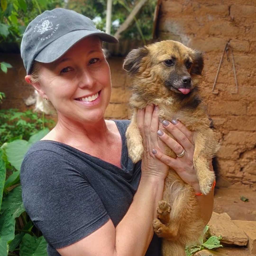 Connie in Peru with a pooch