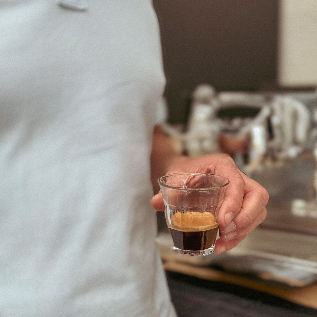 enjoying an espresso